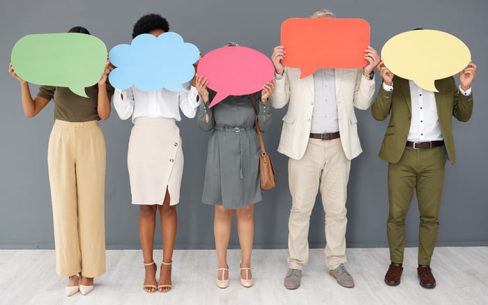 People standing with thought bubbles over faces to express their personal first party data answers to survey questions