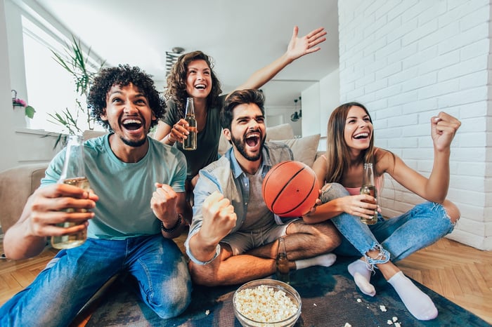 Sports fans cheer for their basketball team